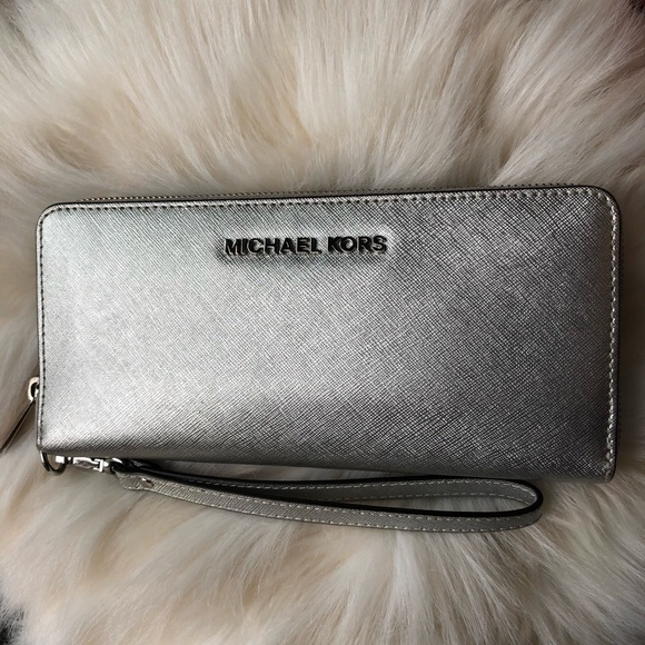 Michael Kors Handbags - Michael Kors Silver Wallet